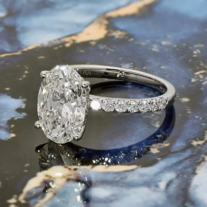 Platinum Laboratory-Grown Diamond 3ct Oval Solitaire with Hidden Halo & Shoulder Diamonds Ring