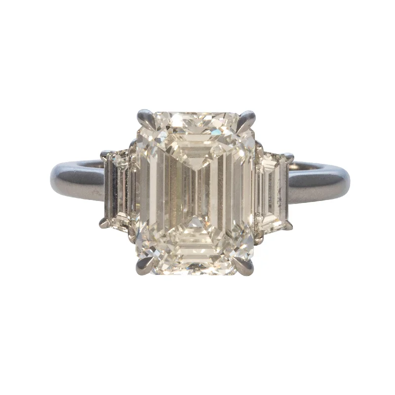 4ct Emerald-Cut & .51ct Trapezoid Side Diamond Three-Stone Platinum Ring